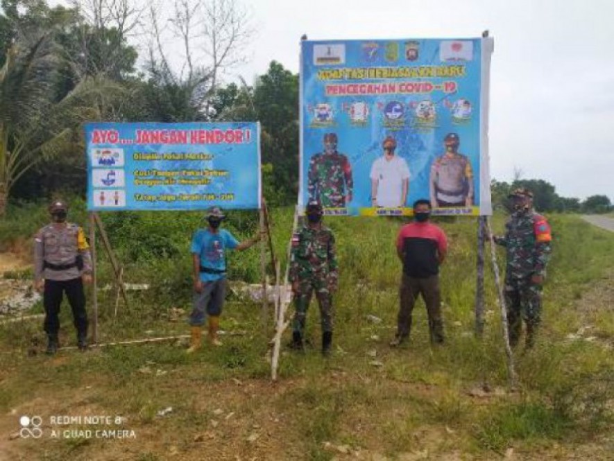  TNI Sambas-Polri Sinergi Cagah Penyebaran Virus Covid-19