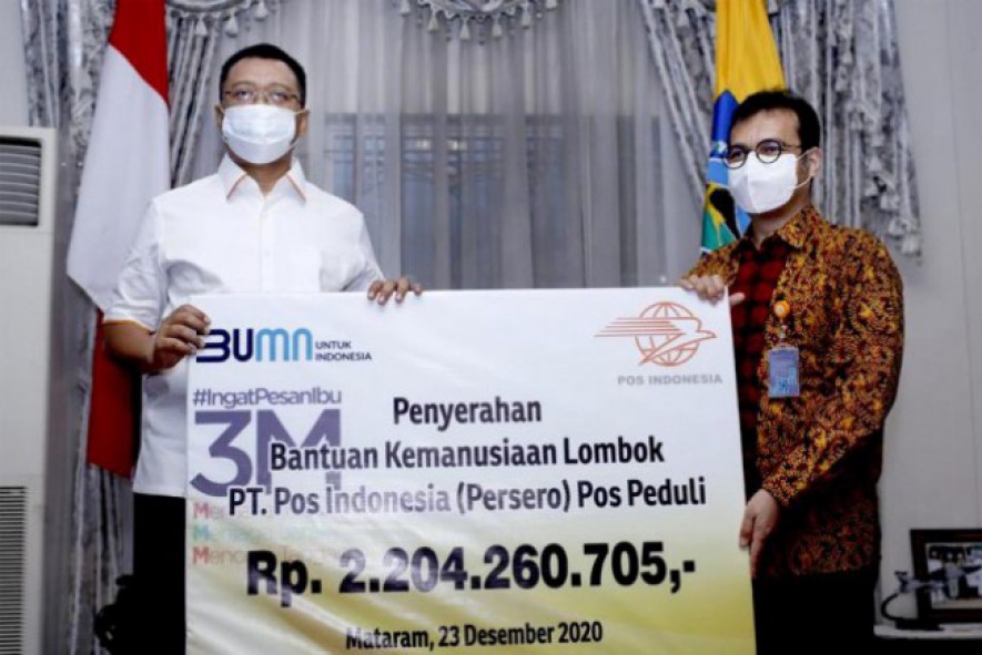 Penyerahan Bantuan Kemanusiaan Lombok PT Pos Indonesia (Persero) Pos Peduli (Photo by BUMN)